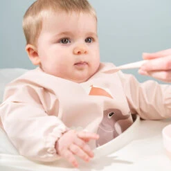 Done By Deer Sleeved Pocket Bib - Playground - Blue 12 Done By Deer Sleeved Pocket Bib - Playground - Blue -Done By Deer Sleeved pocket bib Playground Blue 2 LS 1