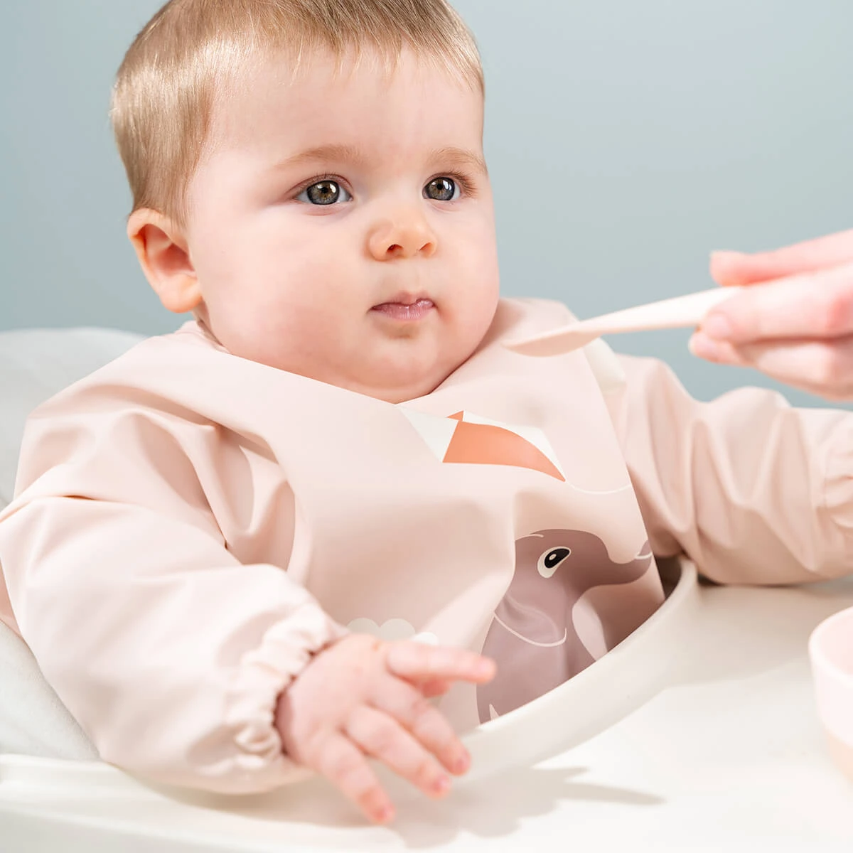 Done By Deer Sleeved Pocket Bib - Playground - Powder 5 Done By Deer Sleeved Pocket Bib - Playground - Powder - Image 3