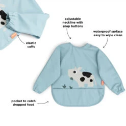Done By Deer Sleeved Pocket Bib - Tiny Farm - Blue 8 Done By Deer Sleeved Pocket Bib - Tiny Farm - Blue -Done By Deer Sleeved pocket bib Tiny farm Blue arrowswithfunctions 3 PS